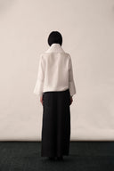 A silk blouse featuring our signature loop-neck - PAYAL KHANDWALA